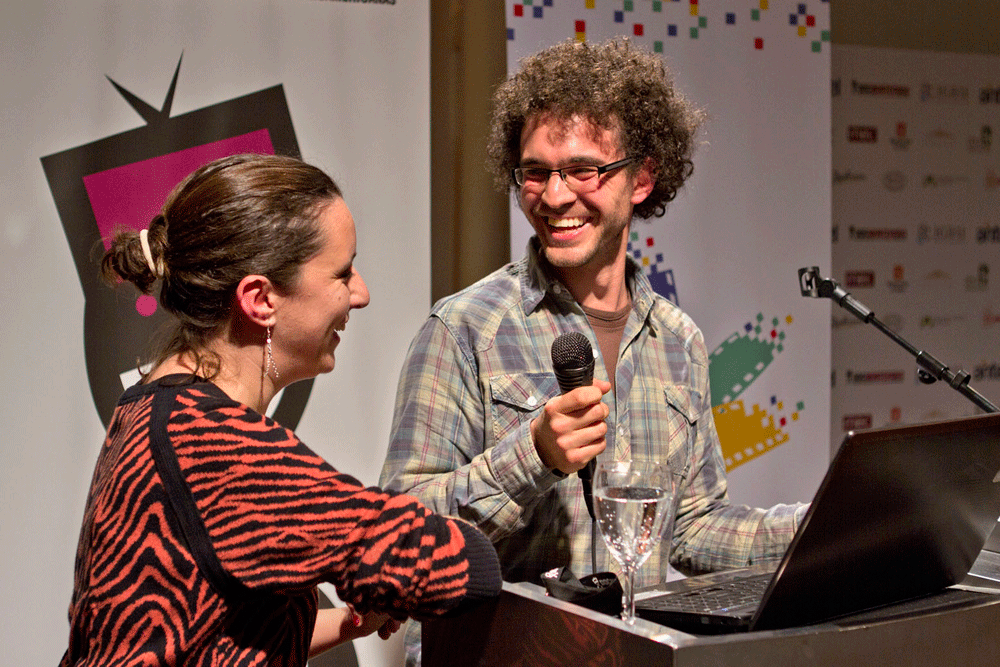 Margarita Brum (productora) y Alan Goldman (coordinador) durante la ceremonia de clausura de DocMontevideo | Teatro Solís | 27/7/2012
